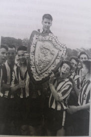 Lex Gold Lifting the 1959 Scottish Schoolboy Shield